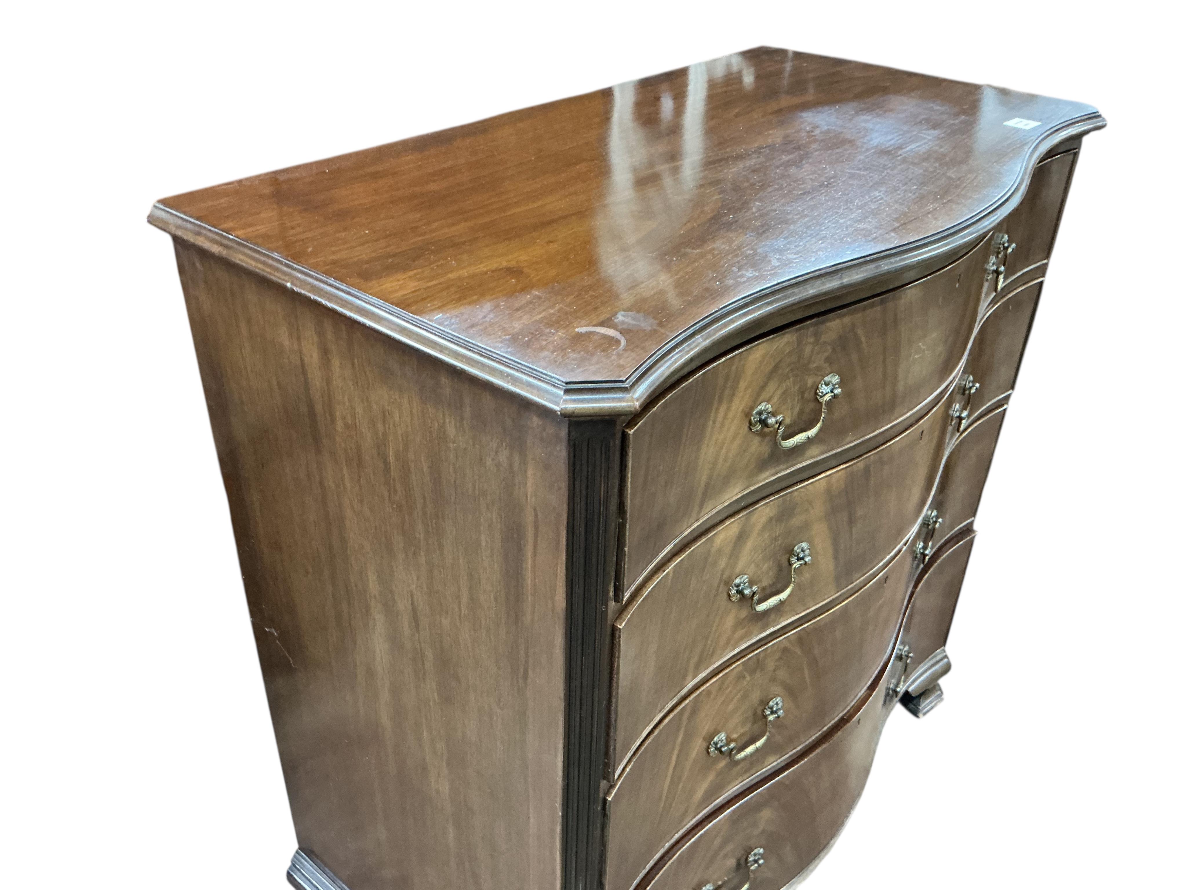 A George III style mahogany serpentine chest of drawers, width 106cm, depth 57cm, height 108cm